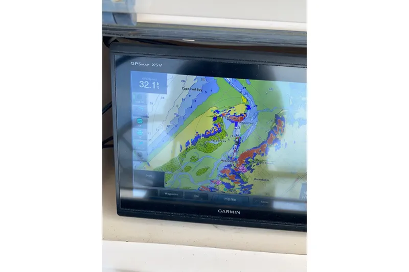 Slide: The Image of Garmin GPS display on 1999 Grady-White Chase 263 boat, showing Cape Cod Bay map. - 38