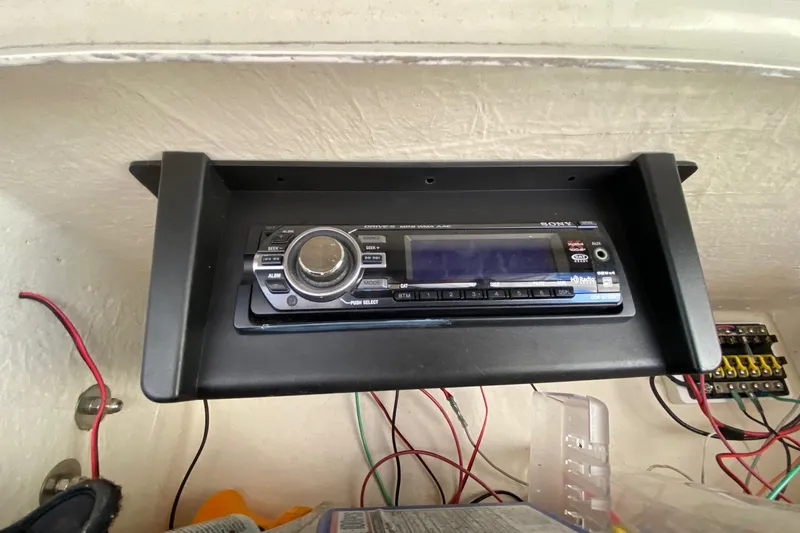 Slide: The Image of Sony stereo system installed in a 1999 Grady-White Chase 263 boat dashboard. - 6