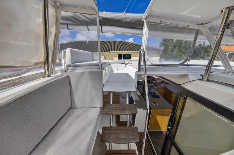 Slide: The Image of Interior view of 2014 Fountaine Pajot Helia 44 catamaran with seating and helm station. - 23