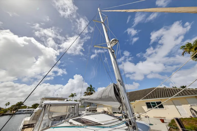 Slide: The Image of Sailboat mast of 2014 Fountaine Pajot Helia 44 under a partly cloudy sky. - 31