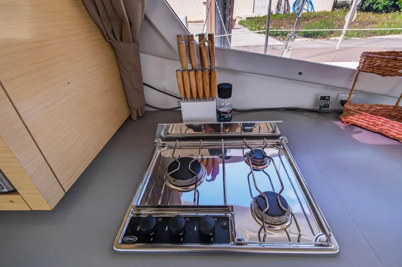 Slide: The Image of Modern kitchen in 2014 Fountaine Pajot Helia 44 catamaran with stainless steel stove. - 47