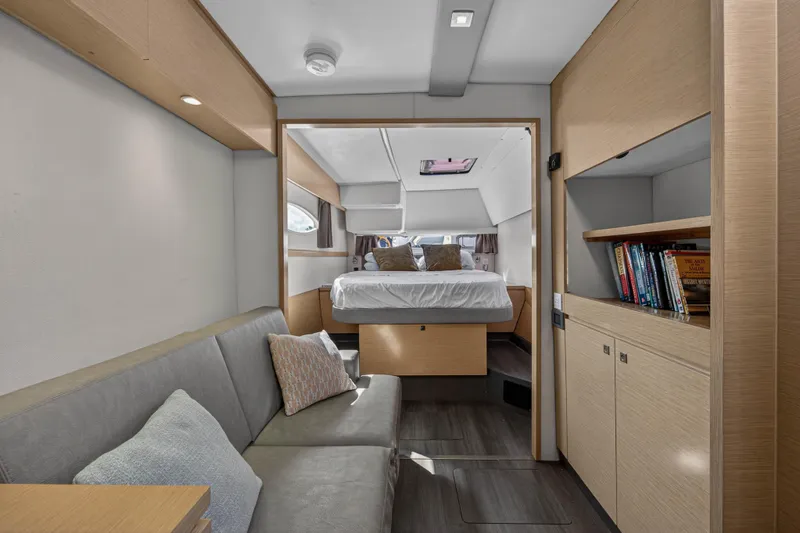 Slide: The Image of Luxurious interior of 2014 Fountaine Pajot Helia 44 catamaran with cozy bedroom and seating area. - 60