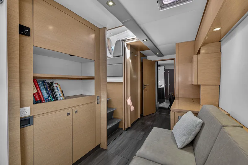 Slide: The Image of Interior of 2014 Fountaine Pajot Helia 44 catamaran with modern wood finish and cozy seating. - 62