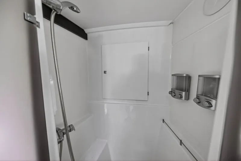 Slide: The Image of Shower area in 2014 Fountaine Pajot Helia 44 catamaran with dispensers and sleek design. - 64