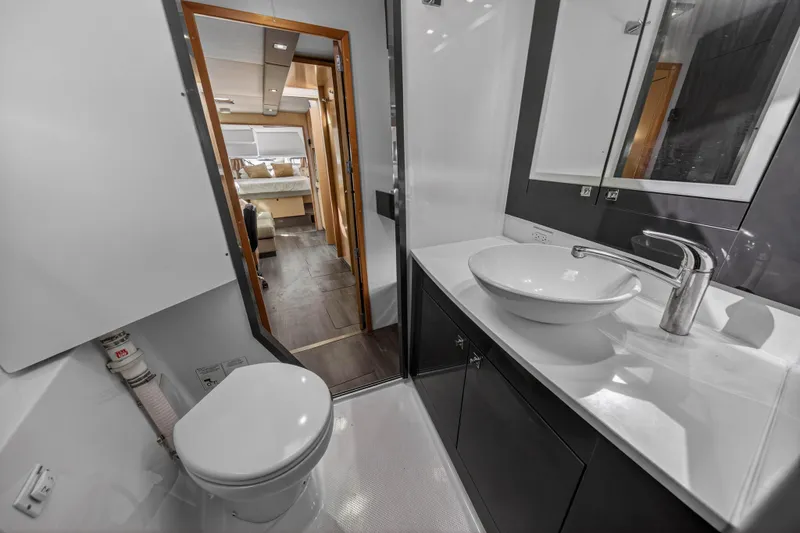 Slide: The Image of Bathroom interior of 2014 Fountaine Pajot Helia 44 catamaran, featuring modern sink and toilet. - 65
