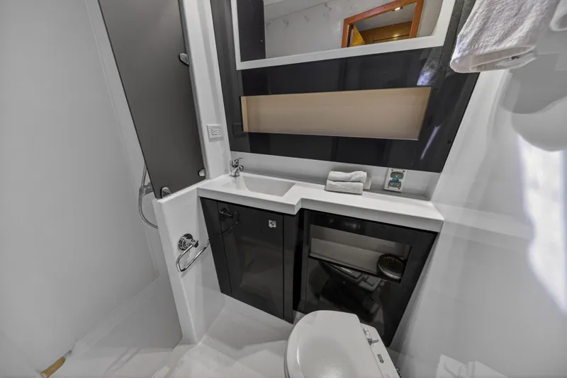 Slide: The Image of Bathroom interior of 2014 Fountaine Pajot Helia 44 catamaran, featuring modern fixtures and sleek design. - 69