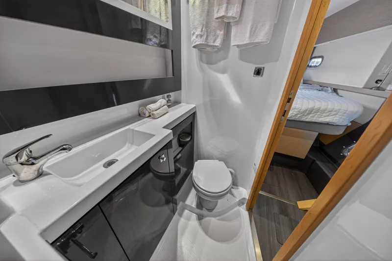 Slide: The Image of Bathroom interior of 2014 Fountaine Pajot Helia 44 catamaran, featuring sink and toilet. - 70