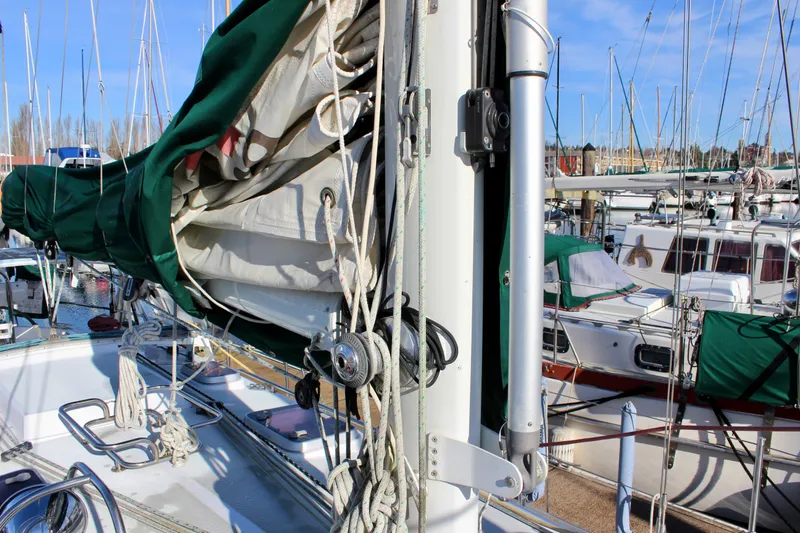 Slide: The Image of Sailboat deck with rigging and sails, Valiant 39, 1997 model, docked in marina. - 18