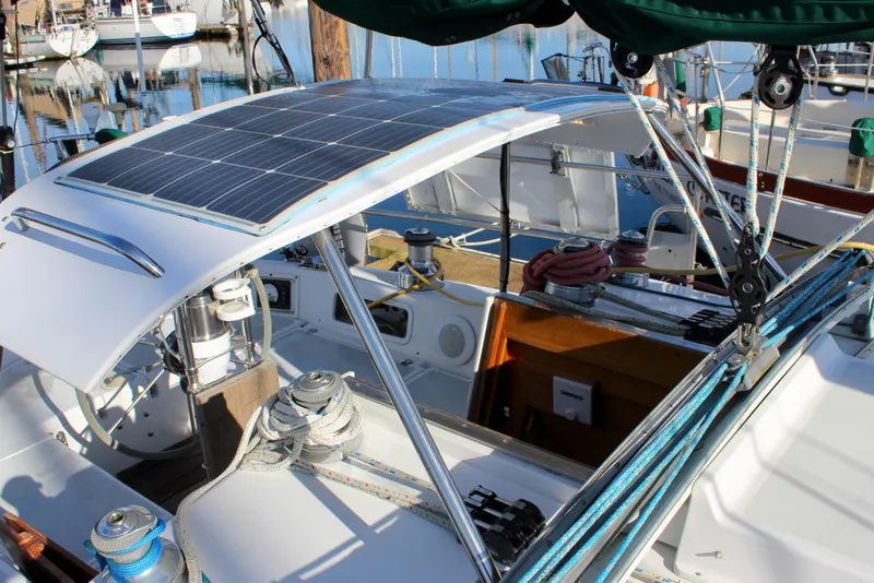 Slide: The Image of 1997 Valiant 39 sailboat cockpit with solar panel and rigging details. - 19