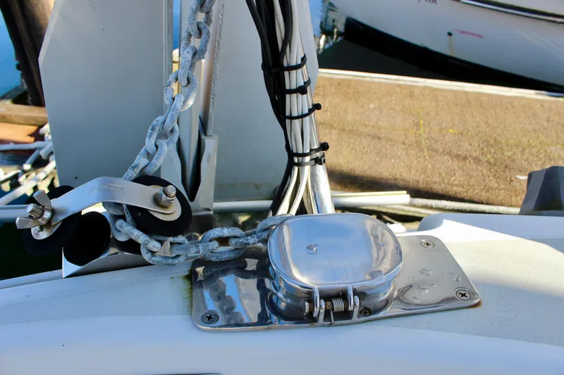 Slide: The Image of Anchor chain and fittings on a 1997 Valiant 39 sailboat deck. - 28