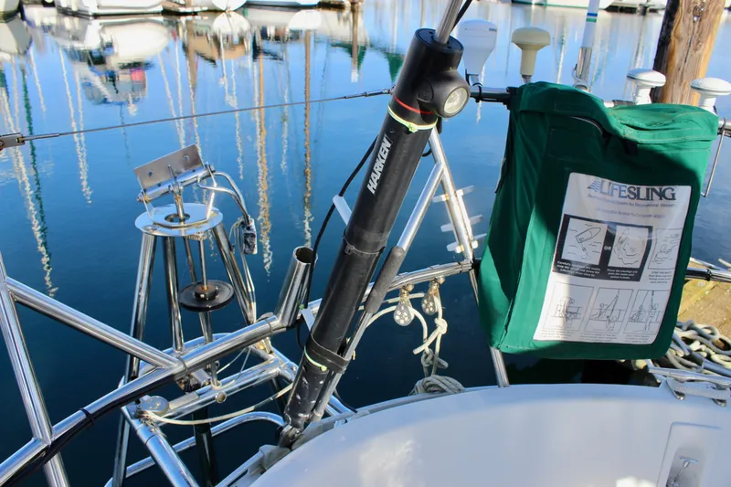 Slide: The Image of Sailboat deck with Lifesling and Harken equipment, Valiant 39, 1997 model, docked at marina. - 29