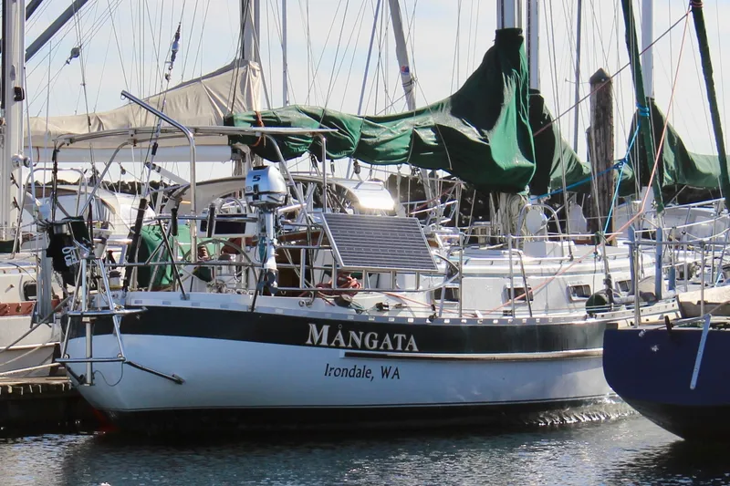 Slide: The Image of Valiant 39 sailboat from 1997 named "Mångata" docked at Irondale, WA marina. - 3