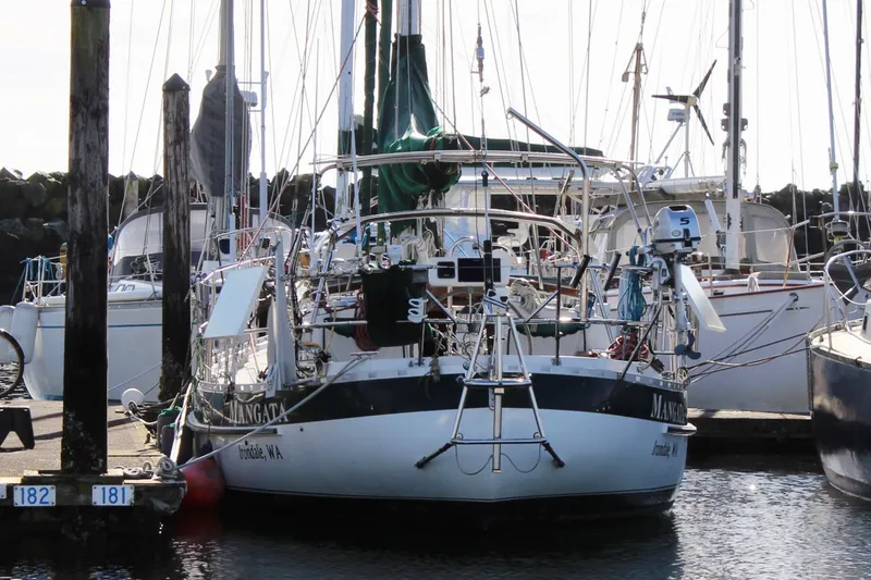 Slide: The Image of Sailboat Valiant 39, 1997 model, docked at marina with other boats. - 4