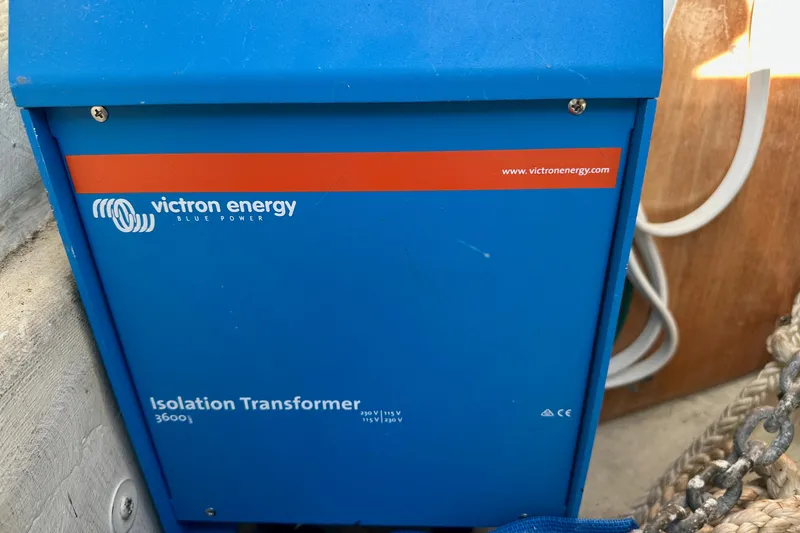 Slide: The Image of Blue Victron Energy isolation transformer on a Valiant 39, 1997 model boat. - 80