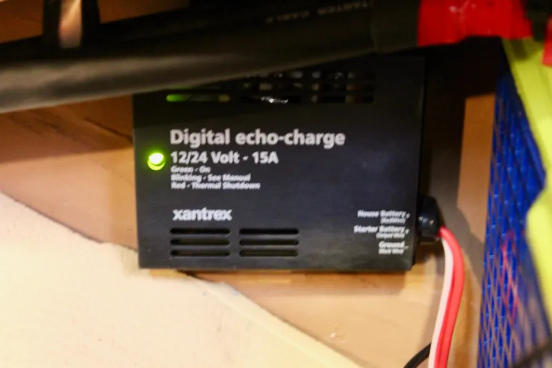 Slide: The Image of Xantrex digital echo-charge device in a 1997 Valiant 39, 12/24 Volt, 15A. - 85