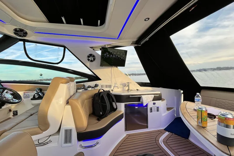 Slide: The Image of Luxurious interior of 2020 Sea Ray Sundancer 320 yacht with modern amenities and scenic water view. - 2