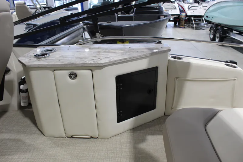 Slide: The Image of Interior of 2025 Avalon 2385 25 Catalina CRB boat with marble countertop and storage compartments. - 12