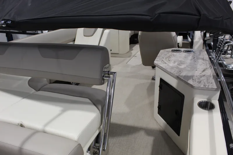 Slide: The Image of 2025 Avalon 2385 25 Catalina CRB interior with seating and countertop details. - 14