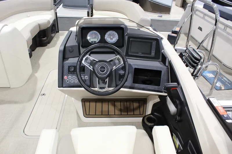 Slide: The Image of Cockpit of 2025 Avalon 2385 25 Catalina CRB boat with steering wheel and controls. - 8
