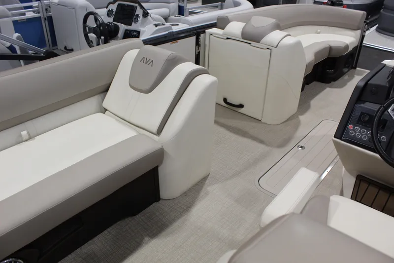 Slide: The Image of 2025 Avalon 2385 25 Catalina CRB interior with luxurious seating and modern dashboard. - 9