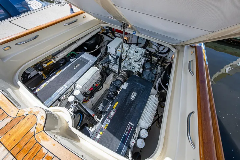 Slide: The Image of Engine compartment of a 2012 Hinckley Runabout 38, showcasing detailed mechanical components. - 15