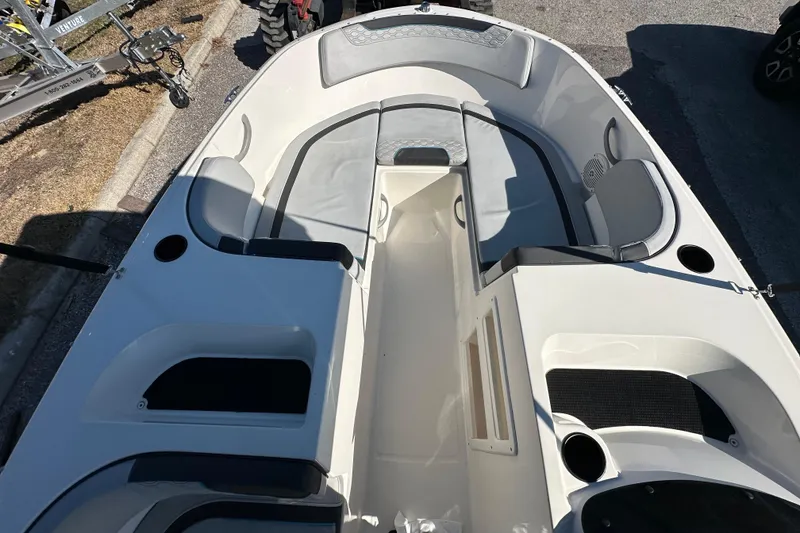 Slide: The Image of 2022 Bayliner Element M17 boat interior with seating and storage compartments. - 8