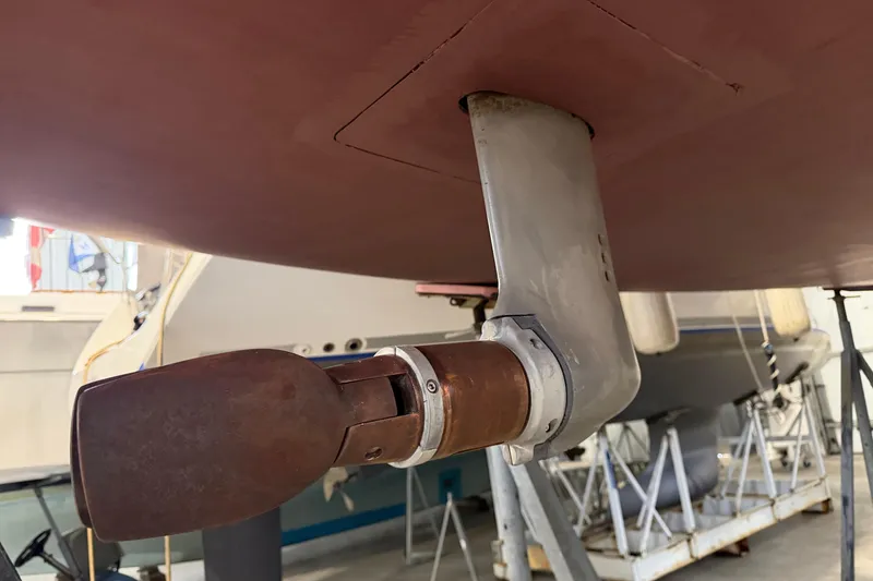 Slide: The Image of Rudder of 2006 Beneteau First 36.7 sailboat in dry dock. - 13