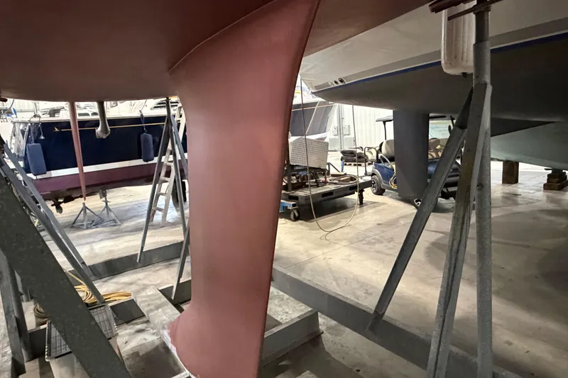 Slide: The Image of Beneteau First 36.7 sailboat keel in a boatyard, 2006 model. - 16