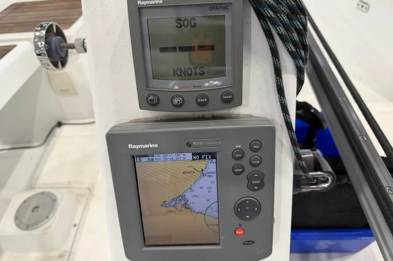 Slide: The Image of Raymarine navigation equipment on 2006 Beneteau First 36.7 sailboat cockpit. - 31