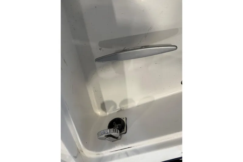 Slide: The Image of Close-up of a 2006 Beneteau First 36.7 boat deck detail with cleat and fitting. - 34