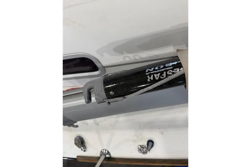 Slide: The Image of Close-up of a 2006 Beneteau First 36.7 sailboat component with carbon fiber detail. - 35