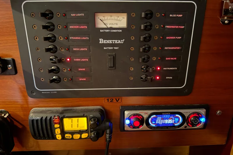 Slide: The Image of Control panel of a 2006 Beneteau First 36.7 sailboat with switches and gauges. - 58