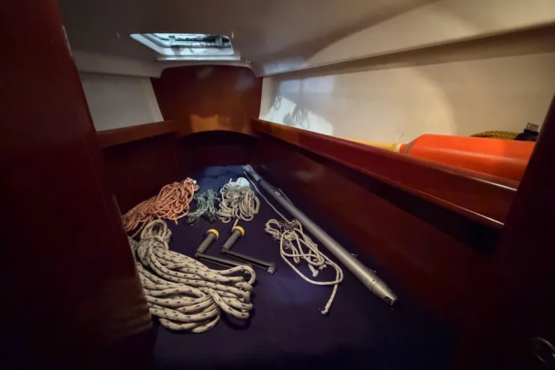 Slide: The Image of Interior of 2006 Beneteau First 36.7 sailboat with ropes and equipment. - 71