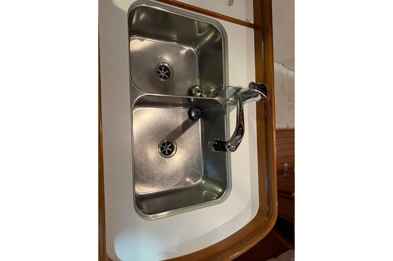 Slide: The Image of Stainless steel double sink in 2006 Beneteau First 36.7 yacht galley. - 76