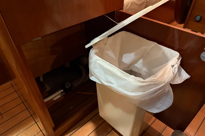 Slide: The Image of Trash bin in the cabin of a 2006 Beneteau First 36.7 sailboat. - 79
