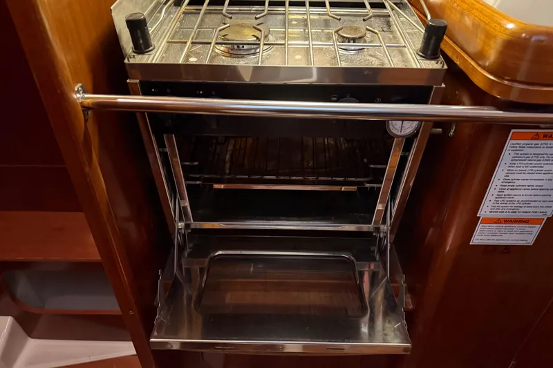 Slide: The Image of Galley stove and oven in 2006 Beneteau First 36.7 yacht interior. - 81