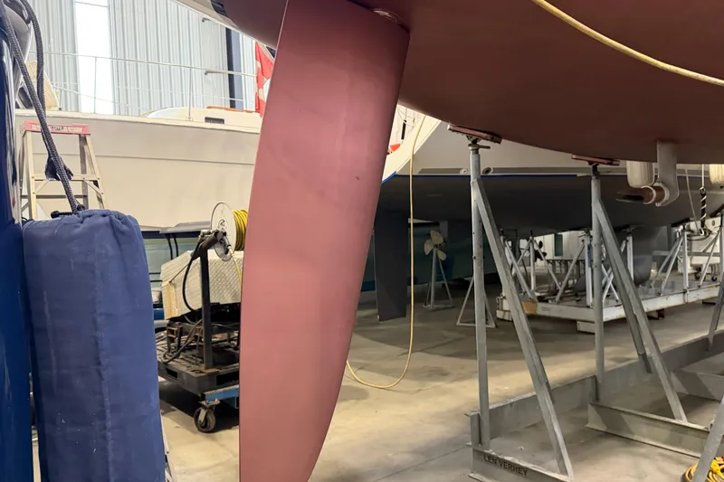 Slide: The Image of 2006 Beneteau First 36.7 sailboat keel in a maintenance facility. - 9