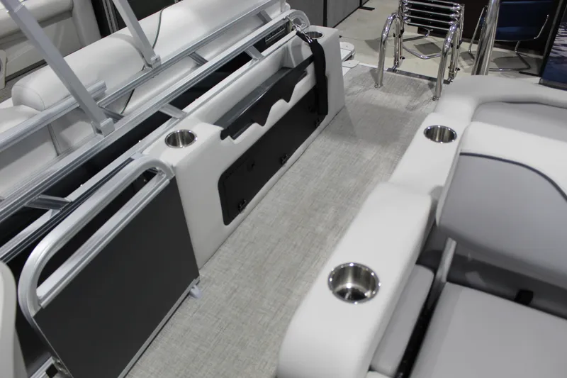 Slide: The Image of Interior of 2026 Avalon 2185 25 Venture 85 VRB boat with seating and cup holders. - 8