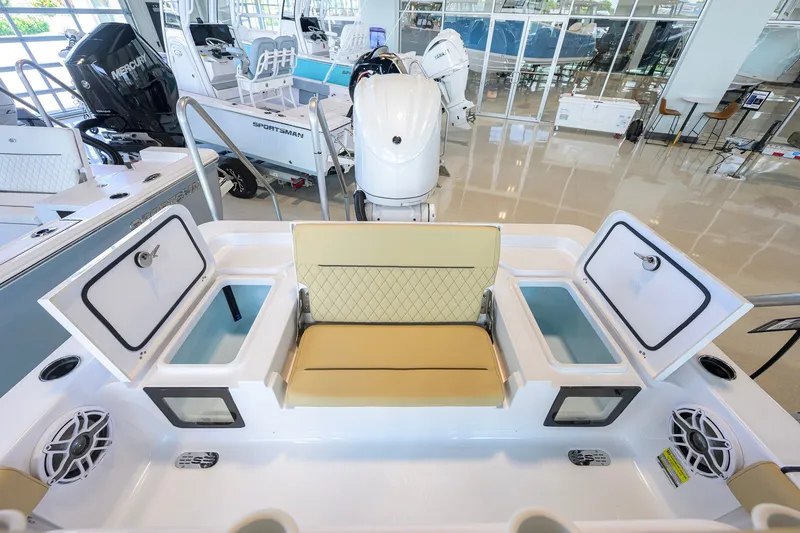 Slide: The Image of 2026 Sportsman Masters 247OE Bay Boat interior with seating and storage compartments. - 34