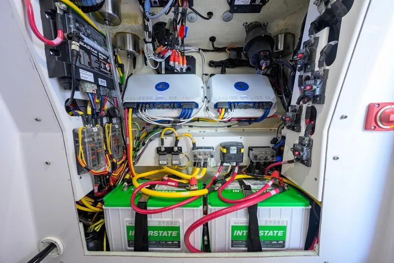 Slide: The Image of Electrical system of 2026 Sportsman Masters 247OE Bay Boat with batteries and wiring. - 46