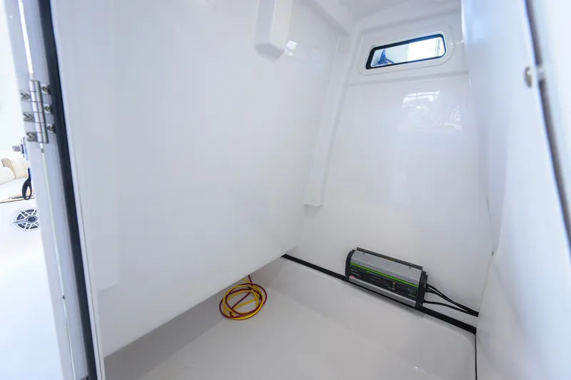 Slide: The Image of Interior view of 2026 Sportsman Masters 247OE Bay Boat storage compartment. - 43