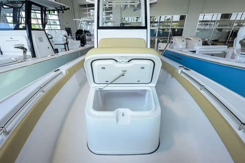 Slide: The Image of 2026 Sportsman Masters 247OE Bay Boat interior with open storage compartment. - 16