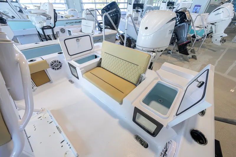 Slide: The Image of 2026 Sportsman Masters 247OE Bay Boat interior with seating and storage compartments. - 33