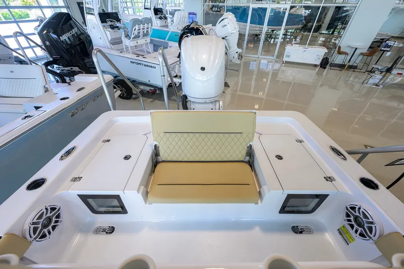 Slide: The Image of 2026 Sportsman Masters 247OE Bay Boat interior with seating and storage compartments. - 30