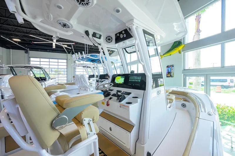 Slide: The Image of Interior view of 2026 Sportsman Masters 247OE Bay Boat with modern controls and seating. - 22