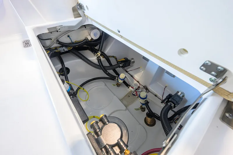 Slide: The Image of 2026 Sportsman Masters 247OE Bay Boat interior wiring and plumbing details. - 41