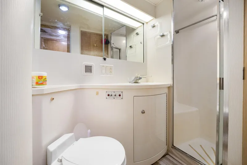 Slide: The Image of Bathroom of 1995 Hatteras 50 Convertible yacht. - 30
