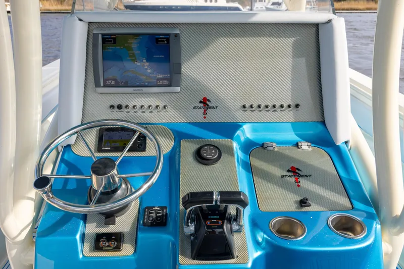 Slide: The Image of Control panel of 2014 Statement 350 Open boat with navigation display and steering wheel. - 20