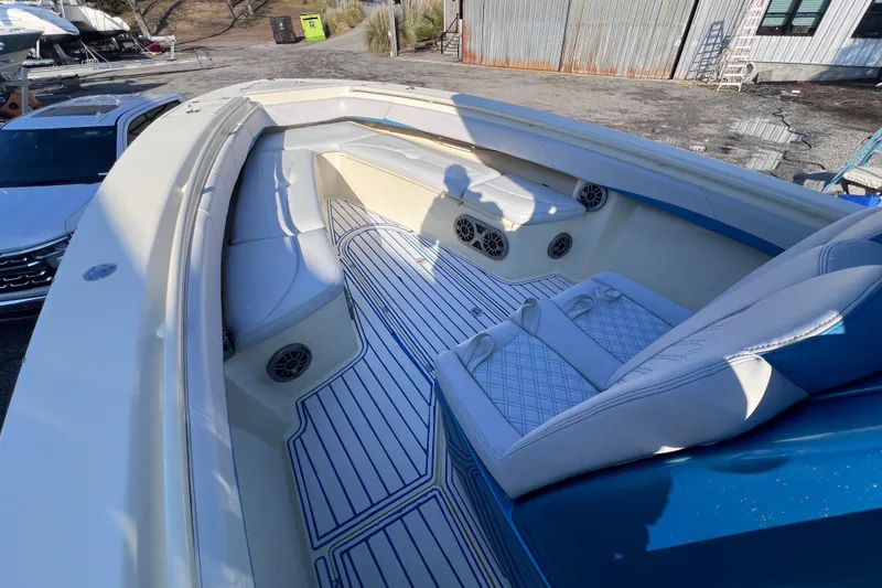 Slide: The Image of Blue 2014 Statement 350 Open boat with twin Yamaha engines on a river. - 6