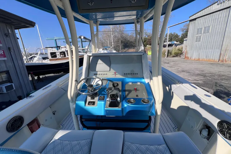 Slide: The Image of Blue 2014 Statement 350 Open boat with twin Yamaha engines on the water. - 9